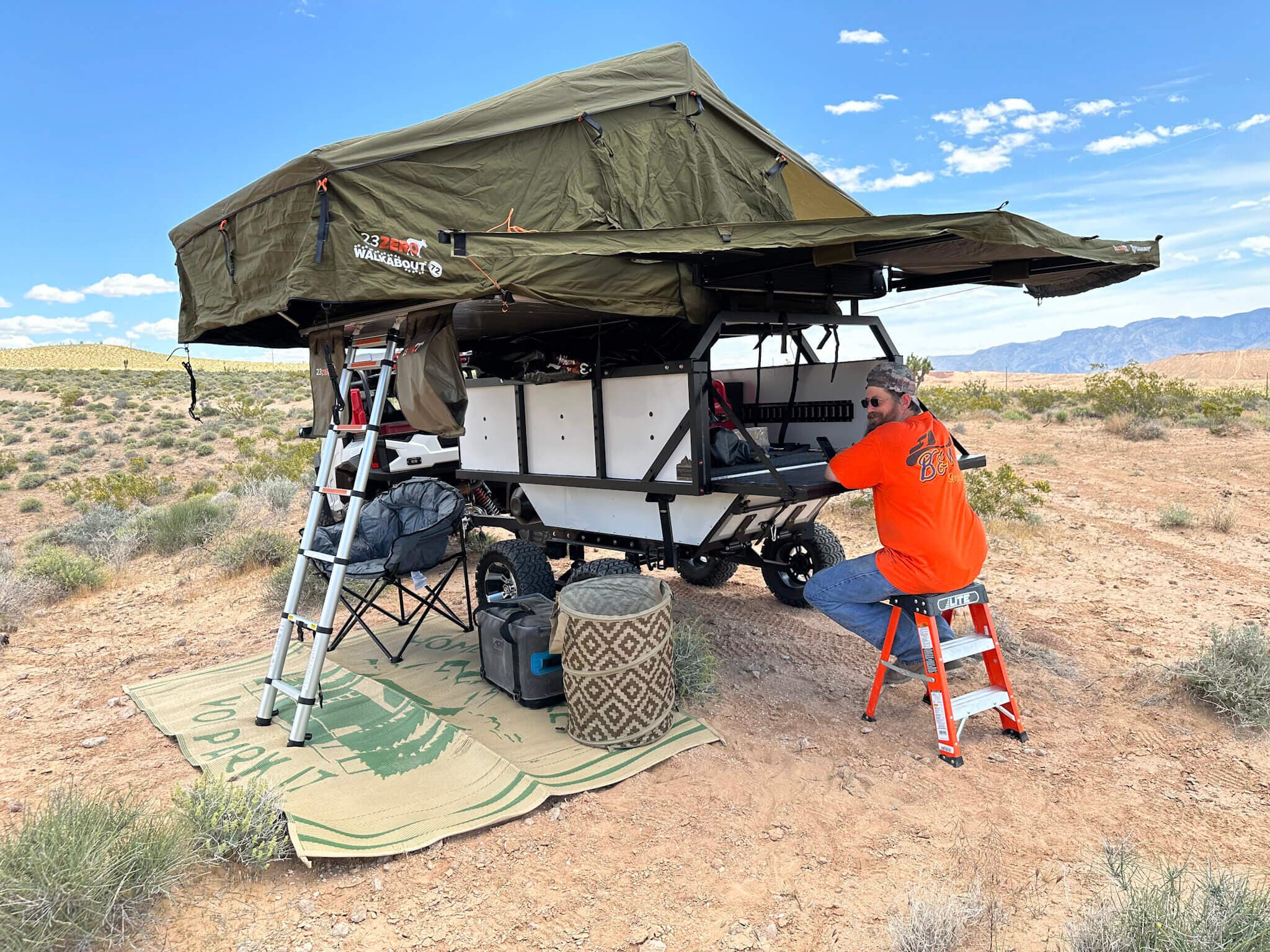 Camp Mansion rooftop tent deployed at desert camp